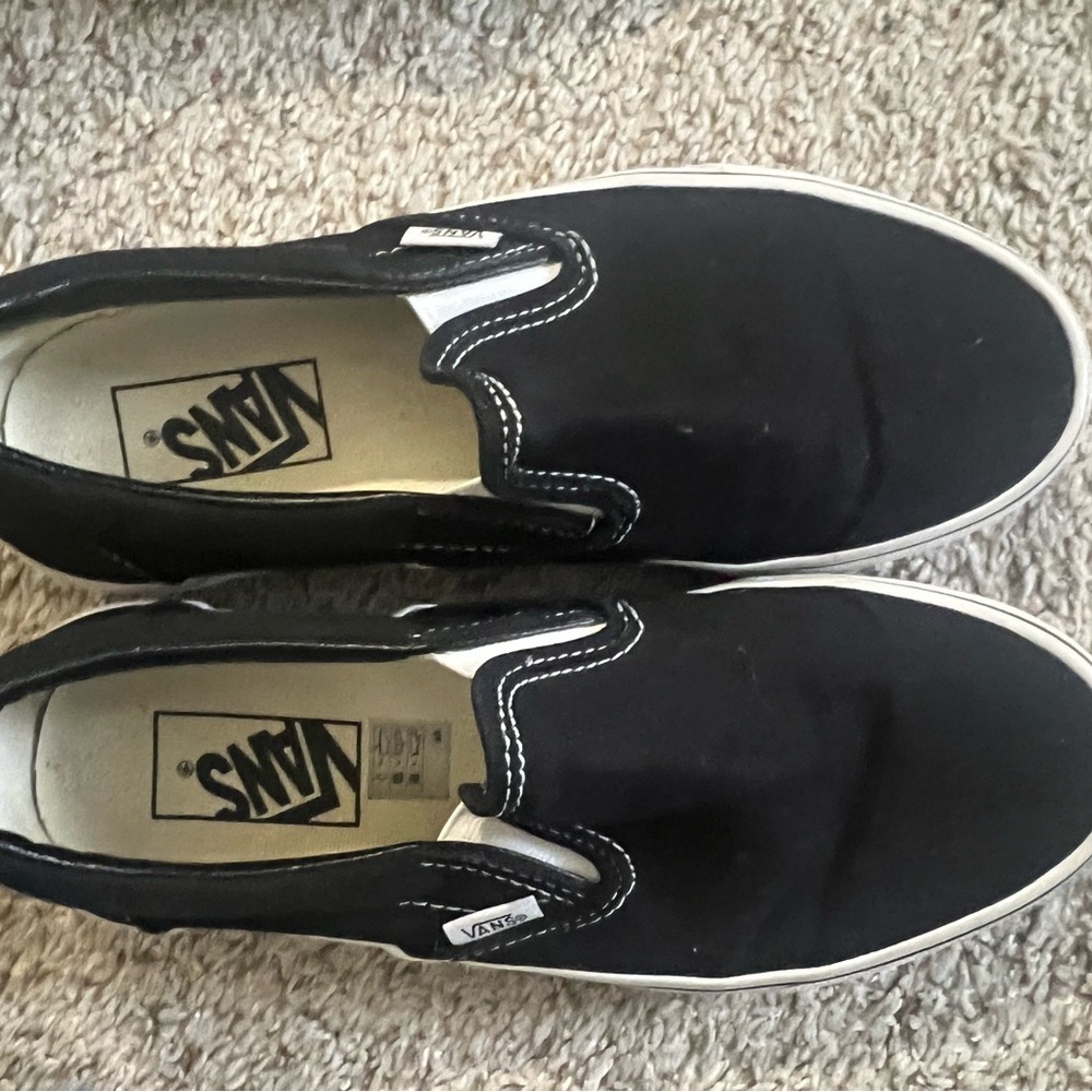 Black slip on vans size W-8 M-6.5